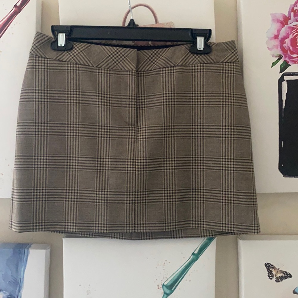 Express mini skirt in brown and gold plaid. Brand New. Size 4
